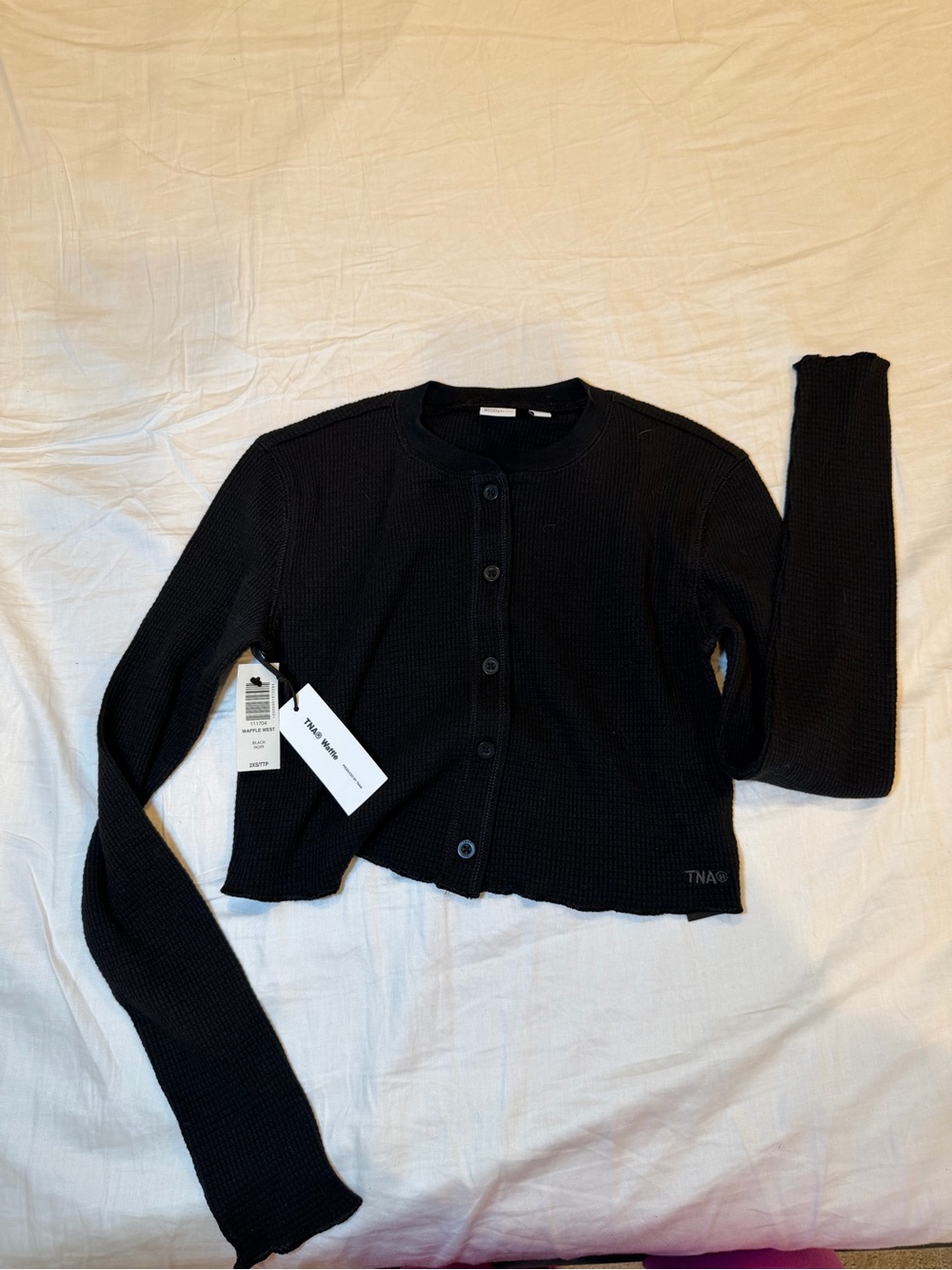 Aritzia TNA Waffle Top – Black
Size 2XS